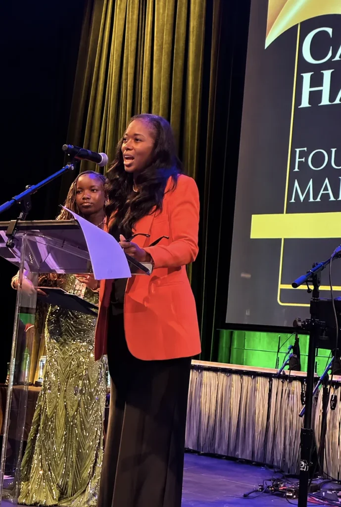 Camille Hastick at a speaking engagement